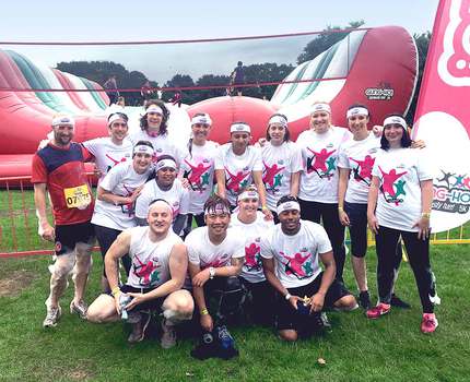 A group of runners that participated in a Gung Ho! marathon to benefit teenage cancer